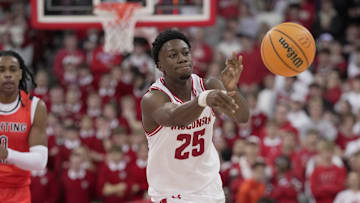 Wisconsin guard John Blackwell (25) passes the ball during the second half of their game against Campbell Monday, November 3, 2025 at the Kohl Center in Madison, Wisconsin.