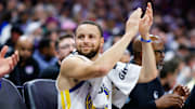 Feb 21, 2025; Sacramento, California, USA; Golden State Warriors guard Stephen Curry (30) claps from the bench during the fourth quarter against the Sacramento Kings at Golden 1 Center. Mandatory Credit: Sergio Estrada-Imagn Images