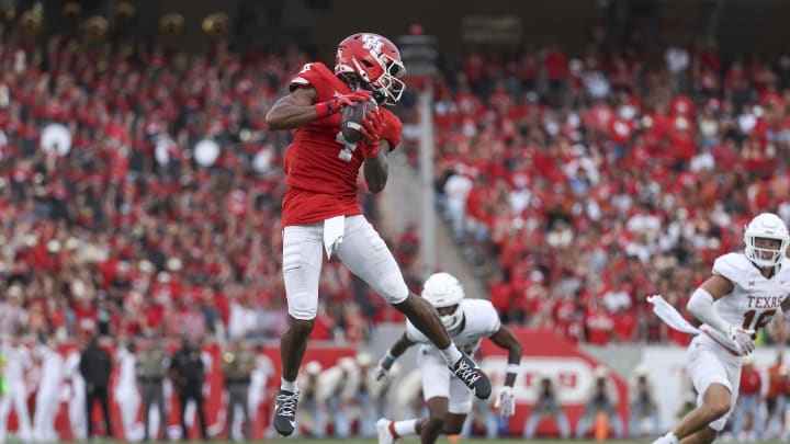 Oct 21, 2023; Houston, Texas, USA;  Houston Cougars wide receiver Samuel Brown (4) makes a reception during the fourth quarter against the Texas Longhorns at TDECU Stadium. Mandatory Credit: Troy Taormina-USA TODAY Sports