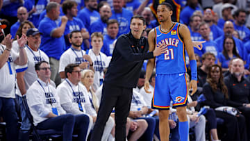 May 28, 2025; Oklahoma City, Oklahoma, USA; Oklahoma City Thunder head coach Mark Daigneault talks with Oklahoma City Thunder guard Aaron Wiggins (21) during the second quarter against the Minnesota Timberwolves in game five of the western conference finals for the 2025 NBA Playoffs at Paycom Center. Mandatory Credit: Alonzo Adams-Imagn Images