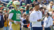 Apr 12, 2025; Notre Dame, IN, USA; Notre Dame Fighting Irish quarterback Steve Angeli (18) watches alongside head coach Marcus Freeman during the Blue-Gold game at Notre Dame Stadium.