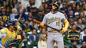 Apr 19, 2025; Milwaukee, Wisconsin, USA; Athletics second baseman Max Muncy (10) reacts after being called out on strikes in the fifth inning against the Milwaukee Brewers at American Family Field. Mandatory Credit: Benny Sieu-Imagn Images