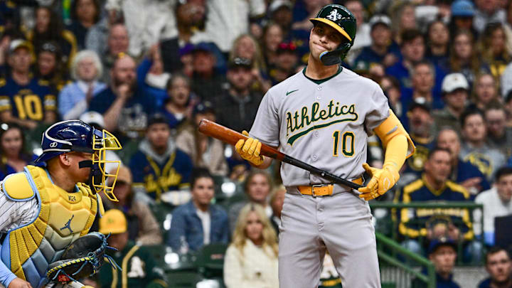 Apr 19, 2025; Milwaukee, Wisconsin, USA; Athletics second baseman Max Muncy (10) reacts after being called out on strikes in the fifth inning against the Milwaukee Brewers at American Family Field. Mandatory Credit: Benny Sieu-Imagn Images