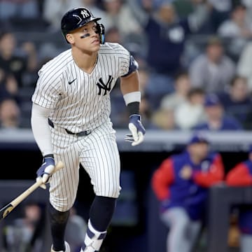 May 20, 2025; Bronx, New York, USA; New York Yankees right fielder Aaron Judge (99) watches his two run home run against the Texas Rangers during the eighth inning at Yankee Stadium. Mandatory Credit: Brad Penner-Imagn Images