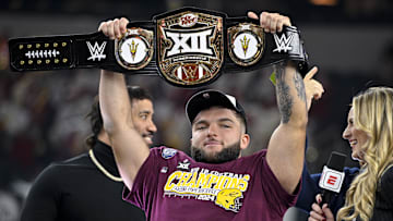 Dec 7, 2024; Arlington, TX, USA; Arizona State Sun Devils running back Cam Skattebo (4) holds up the WWE Big 12 championship belt after the Sun Devils defeat the Iowa State Cyclones and win the 2024 Big 12 Championship at AT&T Stadium. Mandatory Credit: Jerome Miron-Imagn Images