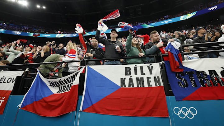 Feb 13, 2026; Milan, Italy; Czech Republic fans celebrate after Michal Kempny of Czech Republic scores their second goal against France in men's ice hockey group A play during the Milano Cortina 2026 Olympic Winter Games at Milano Santagiulia Ice Hockey Arena. Mandatory Credit: Geoff Burke-Imagn Images
