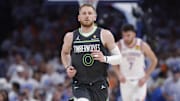 May 20, 2025; Oklahoma City, Oklahoma, USA; Minnesota Timberwolves guard Donte DiVincenzo (0) in the fourth quarter against the Oklahoma City Thunder during game one of the western conference finals for the 2025 NBA Playoffs at Paycom Center. Mandatory Credit: Alonzo Adams-Imagn Images