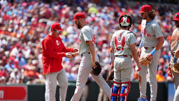 Jun 16, 2024; Baltimore, Maryland, USA; Philadelphia Phillies manager Rob Thomson (59) takes out pitcher Zach Wheeler (45) from the game during the fifth inning against the Baltimore Orioles at Oriole Park at Camden Yards. Mandatory Credit: Gregory Fisher-USA TODAY Sports