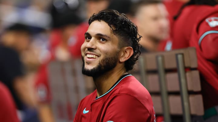 Aug 19, 2024; Miami, Florida, USA; Arizona Diamondbacks catcher Adrian Del Castillo (25) looks on from the dugout after hitting a grand slam against the Miami Marlins during the third inning at loanDepot Park. Mandatory Credit: Sam Navarro-USA TODAY Sports