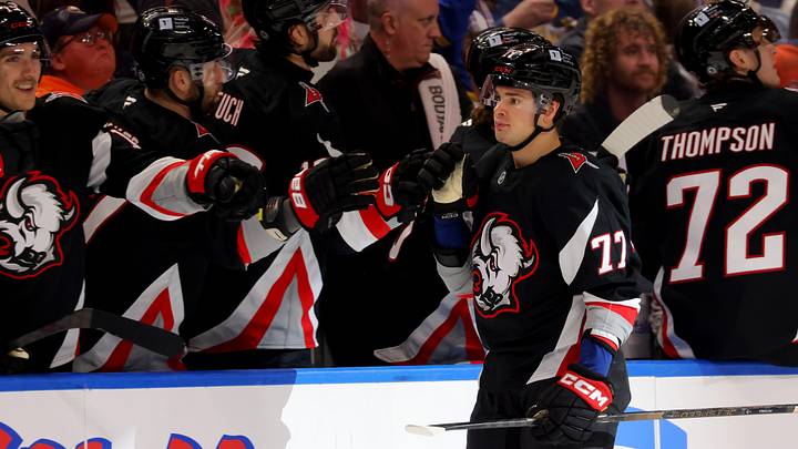 Apr 8, 2025; Buffalo, New York, USA;  Buffalo Sabres right wing JJ Peterka (77) celebrates his goal with teammates during the third period against the Carolina Hurricanes at KeyBank Center. Mandatory Credit: Timothy T. Ludwig-Imagn Images