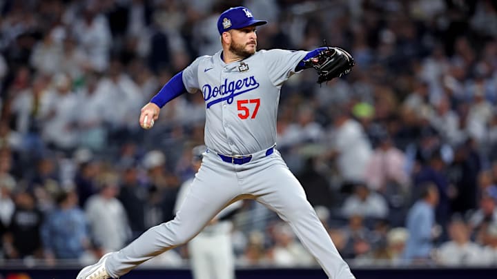 Oct 30, 2024; New York, New York, USA; Los Angeles Dodgers pitcher Ryan Brasier (57) pitches during the third inning against the New York Yankees in game four of the 2024 MLB World Series at Yankee Stadium. Mandatory Credit: Brad Penner-Imagn Images