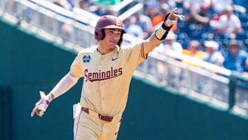 Jun 16, 2024; Omaha, NE, USA; Florida State Seminoles shortstop Alex Lodise (1) celebrates after hitting a home run against the Virginia Cavaliers during the sixth inning at Charles Schwab Field Omaha. Mandatory Credit: Dylan Widger-Imagn Images