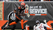 Bengals Tee Higgins (5) leaps to catch the ball and goes on to score a touchdown for the Bengals during their game against the Bears at Paycor Stadium on Sunday November 2, 2025.