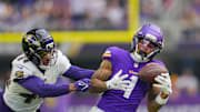 Nov 9, 2025; Minneapolis, Minnesota, USA; Minnesota Vikings wide receiver Jalen Nailor (1) catches a pass against Baltimore Ravens cornerback Marlon Humphrey (44) in the first quarter at U.S. Bank Stadium. Mandatory Credit: Brad Rempel-Imagn Images