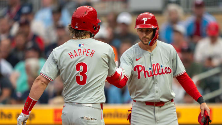 Jul 22, 2024; Minneapolis, Minnesota, USA; Philadelphia Phillies first baseman Bryce Harper (3) celebrates with shortstop Trea Turner (7) after hitting a a two run home run against the Minnesota Twins in the first inning at Target Field. Mandatory Credit: Jesse Johnson-USA TODAY Sports