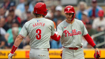 Jul 22, 2024; Minneapolis, Minnesota, USA; Philadelphia Phillies first baseman Bryce Harper (3) celebrates with shortstop Trea Turner (7) after hitting a a two run home run against the Minnesota Twins in the first inning at Target Field.