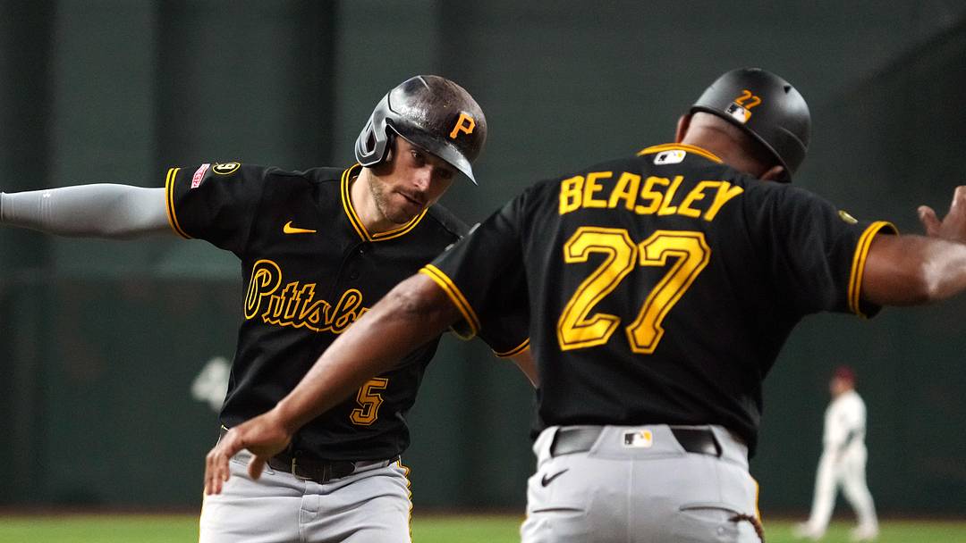May 7, 2026; Phoenix, Arizona, USA; Pittsburgh Pirates second baseman Brandon Lowe (5) hits a solo home run against the Arizona Diamondbacks in the first inning at Chase Field. Mandatory Credit: Rick Scuteri-Imagn Images