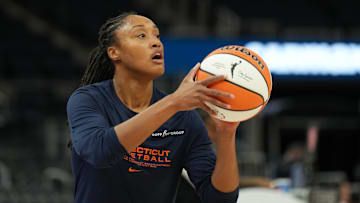 Jun 22, 2025; San Francisco, California, USA; Connecticut Sun guard Jaelyn Brown (18) warms up before the game against the Golden State Valkyries at Chase Center. Mandatory Credit: Darren Yamashita-Imagn Images