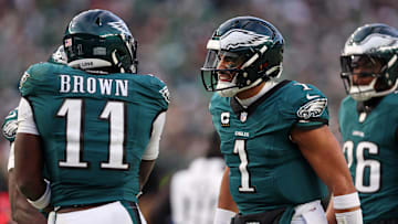 Jan 26, 2025; Philadelphia, PA, USA; Philadelphia Eagles quarterback Jalen Hurts (1) and wide receiver A.J. Brown (11) celebrate after a touchdown against the Washington Commanders during the first half in the NFC Championship game at Lincoln Financial Field. Mandatory Credit: Bill Streicher-Imagn Images