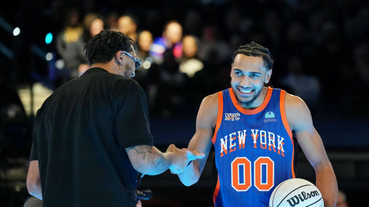 Feb 17, 2024; Indianapolis, IN, USA; New York Knicks forward Jacob Toppin (3) with his brother Indiana Pacers forward Obi Toppin during the slam dunk competition during NBA All Star Saturday Night at Lucas Oil Stadium. Mandatory Credit: Kyle Terada-USA TODAY Sports