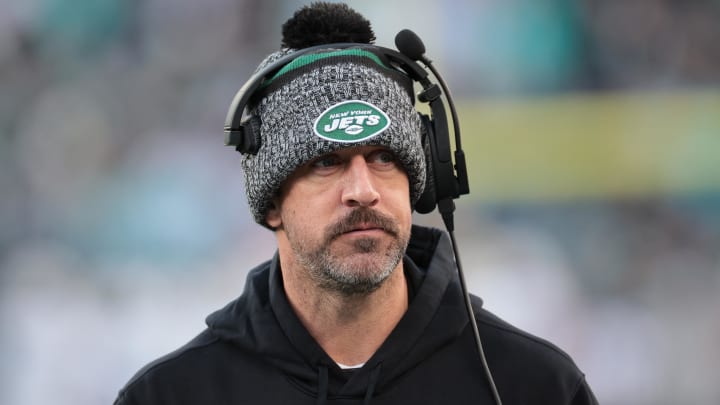 Nov 24, 2023; East Rutherford, New Jersey, USA; New York Jets quarterback Aaron Rodgers (8) on the sidelines during the first half against the Miami Dolphins at MetLife Stadium.