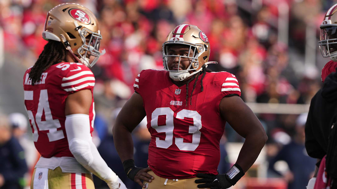 Dec 10, 2023; Santa Clara, California, USA; San Francisco 49ers defensive tackle Kalia Davis (93) stands on the field with linebacker Fred Warner (54) during the first quarter against the Seattle Seahawks at Levi's Stadium.
