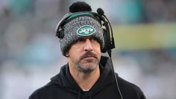 Nov 24, 2023; East Rutherford, New Jersey, USA; New York Jets quarterback Aaron Rodgers (8) on the sidelines during the first half against the Miami Dolphins at MetLife Stadium.