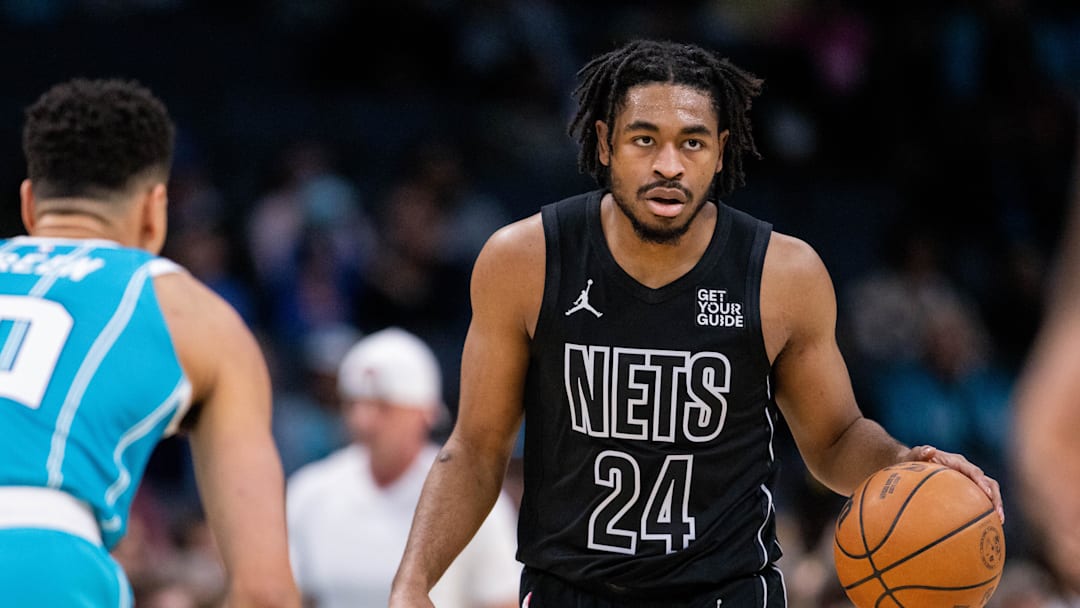 Mar 8, 2025; Charlotte, North Carolina, USA; Brooklyn Nets guard Cam Thomas (24) brings the ball up court against the Charlotte Hornets during the first quarter at Spectrum Center. Mandatory Credit: Scott Kinser-Imagn Images