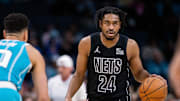 Mar 8, 2025; Charlotte, North Carolina, USA; Brooklyn Nets guard Cam Thomas (24) brings the ball up court against the Charlotte Hornets during the first quarter at Spectrum Center. Mandatory Credit: Scott Kinser-Imagn Images