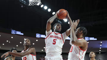 Dec 13, 2022; Houston, Texas, USA; Houston Cougars forward Ja'Vier Francis (5) grabs a rebound