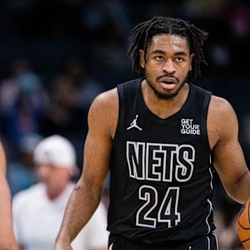 Brooklyn Nets guard Cam Thomas (24) brings the ball up court against the Charlotte Hornets.