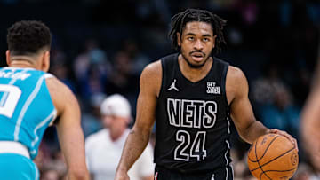 Mar 8, 2025; Charlotte, North Carolina, USA; Brooklyn Nets guard Cam Thomas (24) brings the ball up court against the Charlotte Hornets during the first quarter at Spectrum Center. Mandatory Credit: Scott Kinser-Imagn Images