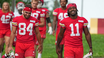 Jul 22, 2025; St. Joseph, MO, USA; Kansas City Chiefs wide receivers Mac Dalena (84) and Jalen Royals (11) walk down the hill to the practice fields during training camp at Missouri Western State University. Mandatory Credit: Denny Medley-Imagn Images