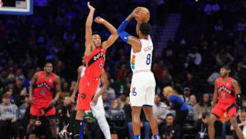 Feb 11, 2025; Philadelphia, Pennsylvania, USA; Philadelphia 76ers forward Paul George (8) shoots the ball against Toronto Raptors forward Scottie Barnes (4) in the third quarter at Wells Fargo Center. Mandatory Credit: Kyle Ross-Imagn Images