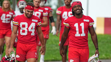 Jul 22, 2025; St. Joseph, MO, USA; Kansas City Chiefs wide receivers Mac Dalena (84) and Jalen Royals (11) walk down the hill to the practice fields during training camp at Missouri Western State University. Mandatory Credit: Denny Medley-Imagn Images