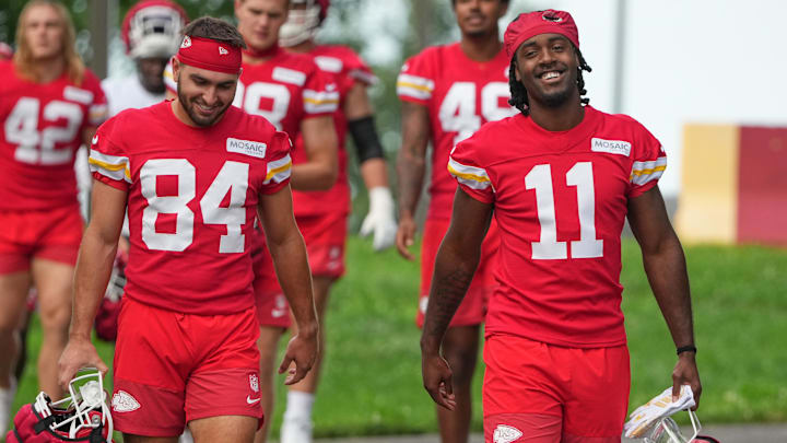 Jul 22, 2025; St. Joseph, MO, USA; Kansas City Chiefs wide receivers Mac Dalena (84) and Jalen Royals (11) walk down the hill to the practice fields during training camp at Missouri Western State University. Mandatory Credit: Denny Medley-Imagn Images