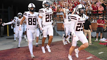 Sep 7, 2024; Pullman, Washington, USA; Texas Tech Red Raiders run onto the field for a game against the Washington State Cougars at Gesa Field at Martin Stadium. Mandatory Credit: James Snook-Imagn Images