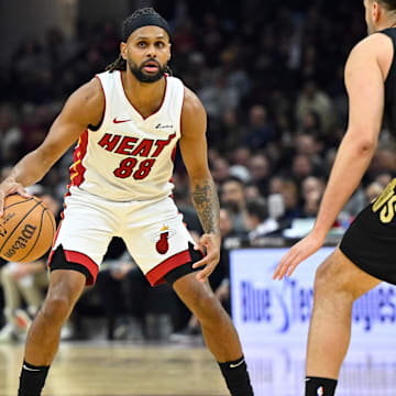 Mar 20, 2024; Cleveland, Ohio, USA; Miami Heat guard Patty Mills (88) dribbles the ball in the second quarter against the Cleveland Cavaliers at Rocket Mortgage FieldHouse. Mandatory Credit: David Richard-Imagn Images