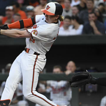 May 1, 2024; Baltimore, Maryland, USA;  Baltimore Orioles outfielder Heston Kjerstad (13) singles during the third inning against the New York Yankees at Oriole Park at Camden Yards