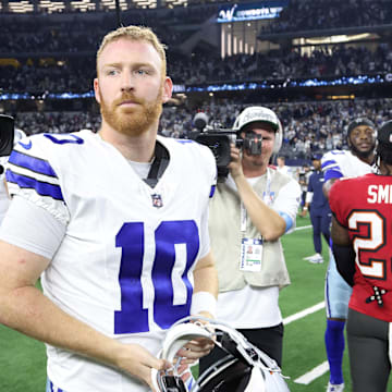 Dallas Cowboys quarterback Cooper Rush (10) walks off the field after the game against the Tampa Bay Buccaneers at AT&T Stadium.