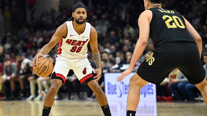 Mar 20, 2024; Cleveland, Ohio, USA; Miami Heat guard Patty Mills (88) dribbles the ball in the second quarter against the Cleveland Cavaliers at Rocket Mortgage FieldHouse. Mandatory Credit: David Richard-Imagn Images