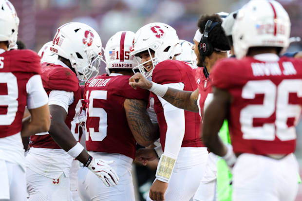 Stanford quarterback Elijah Brown celebrates with teammates after a touchdown in a game earlier this season.