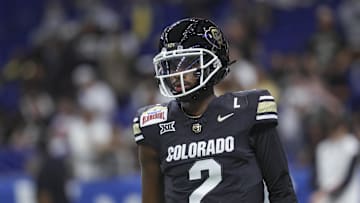 Dec 28, 2024; San Antonio, TX, USA; Colorado Buffaloes quarterback Shedeur Sanders (2) warms up before the game against the Brigham Young Cougars at Alamodome. Mandatory Credit: Troy Taormina-Imagn Images