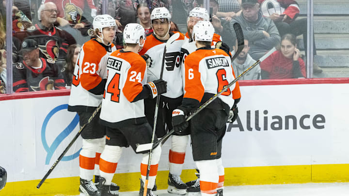 Apr 13, 2025; Ottawa, Ontario, CAN; Philadelphia Flyers right wing Garnet Hathaway (19) celebrates his goal scored in the third period against the Ottawa Senators at the Canadian Tire Centre.