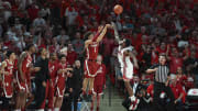 Dec 10, 2022; Houston, Texas, USA; Alabama Crimson Tide guard Mark Sears (1) shoots the ball as Houston Cougars guard Jamal Shead (1) defends during the second half at Fertitta Center. Mandatory Credit: Troy Taormina-USA TODAY Sports