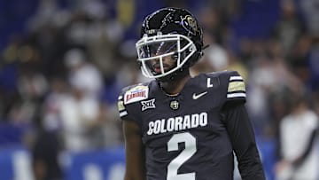 Dec 28, 2024; San Antonio, TX, USA; Colorado Buffaloes quarterback Shedeur Sanders (2) warms up before the game against the Brigham Young Cougars at Alamodome. Mandatory Credit: Troy Taormina-Imagn Images