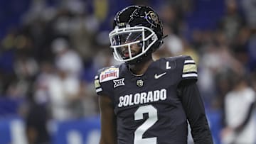 Dec 28, 2024; San Antonio, TX, USA; Colorado Buffaloes quarterback Shedeur Sanders (2) warms up before the game against the Brigham Young Cougars at Alamodome. Mandatory Credit: Troy Taormina-Imagn Images
