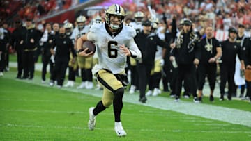 Dec 7, 2025; Tampa, Florida, USA; New Orleans Saints quarterback Tyler Shough (6) runs for a touchdown during the fourth quarter against the Tampa Bay Buccaneers at Raymond James Stadium. Mandatory Credit: Kim Klement Neitzel-Imagn Images