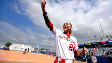 Oklahoma's Jayda Coleman (24) waves to the crowd following the Women's College World Series semifinal game between the Oklahoma and Florida at Devon Park in Oklahoma City, Tuesday, June, 4, 2024.