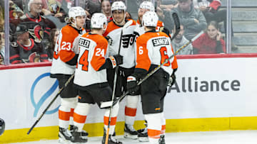Apr 13, 2025; Ottawa, Ontario, CAN; Philadelphia Flyers right wing Garnet Hathaway (19) celebrates his goal scored in the third period against the Ottawa Senators at the Canadian Tire Centre. Mandatory Credit: Marc DesRosiers-Imagn Images